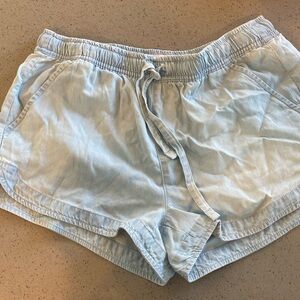 Denim shorts. Never worn.